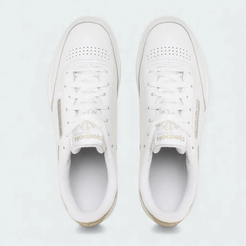 Top-Down view of a pair of Reebok Classic Club C 85 Unisex trainers in white, highlighting their clean shape and lace-up closure.