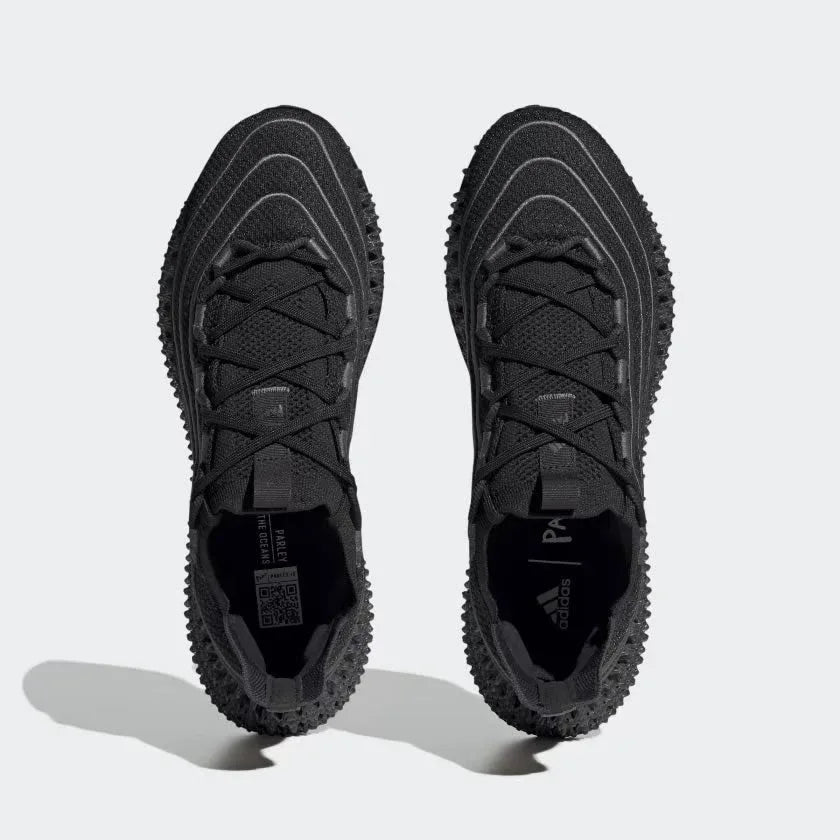 Top-down view of a pair of Adidas 4DFWD x Parley running trainers in black, highlighting their seamless knit construction and unique lacing.