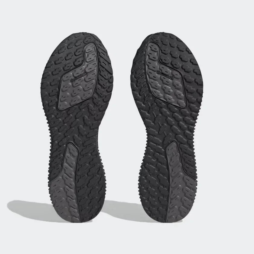 View of the outsole of the Adidas 4DFWD x Parley trainers, showing the durable rubber sole and intricate 3D-printed lattice structure.