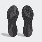View of the outsole of the Adidas 4DFWD x Parley trainers, showing the durable rubber sole and intricate 3D-printed lattice structure.