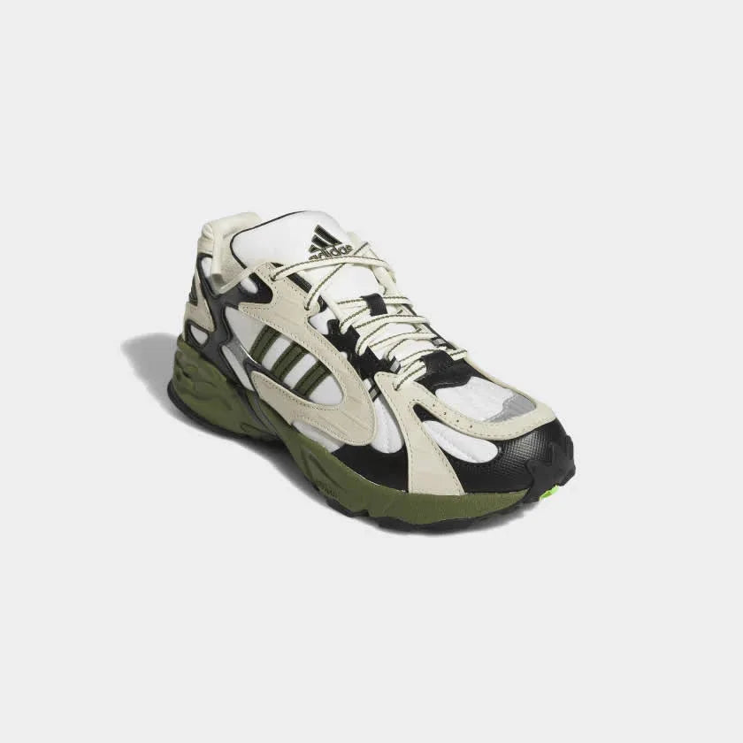 Angled view of Adidas x Ivy Park Savage V4 sneakers in core white with green and blue accents, side by side, showcasing their bold design.
