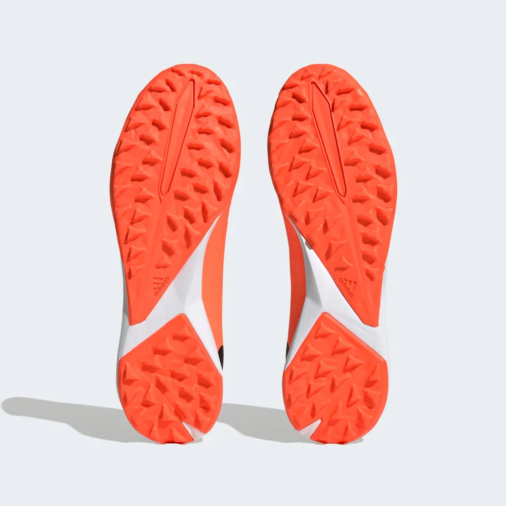 Top-down view of a pair of Adidas Predator Accuracy.3 Laceless Turf Boots in orange, highlighting their seamless laceless strike zone and control texture.