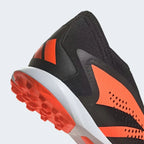 Detailed zoom on the outsole and midsole of the Adidas Predator Accuracy.3 Turf Boots, highlighting the cushioned material and the rubber turf sole.
