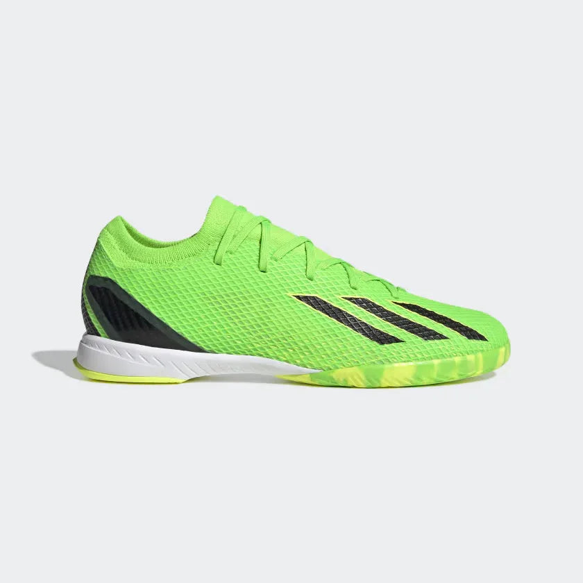 Adidas X Speedportal.3 Indoor Men's football boots in green with black accents, side profile showing coated textile upper, sleek silhouette, and non-marking rubber sole. Main image