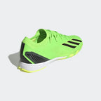 Rear view of the Adidas X Speedportal.3 Indoor Men's green boots, focusing on the structured heel and subtle branding.