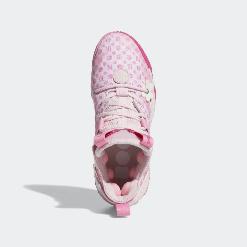 Pink sneaker with floral pattern on a light gray background