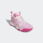 Pink and white sneaker with floral pattern on a light gray background