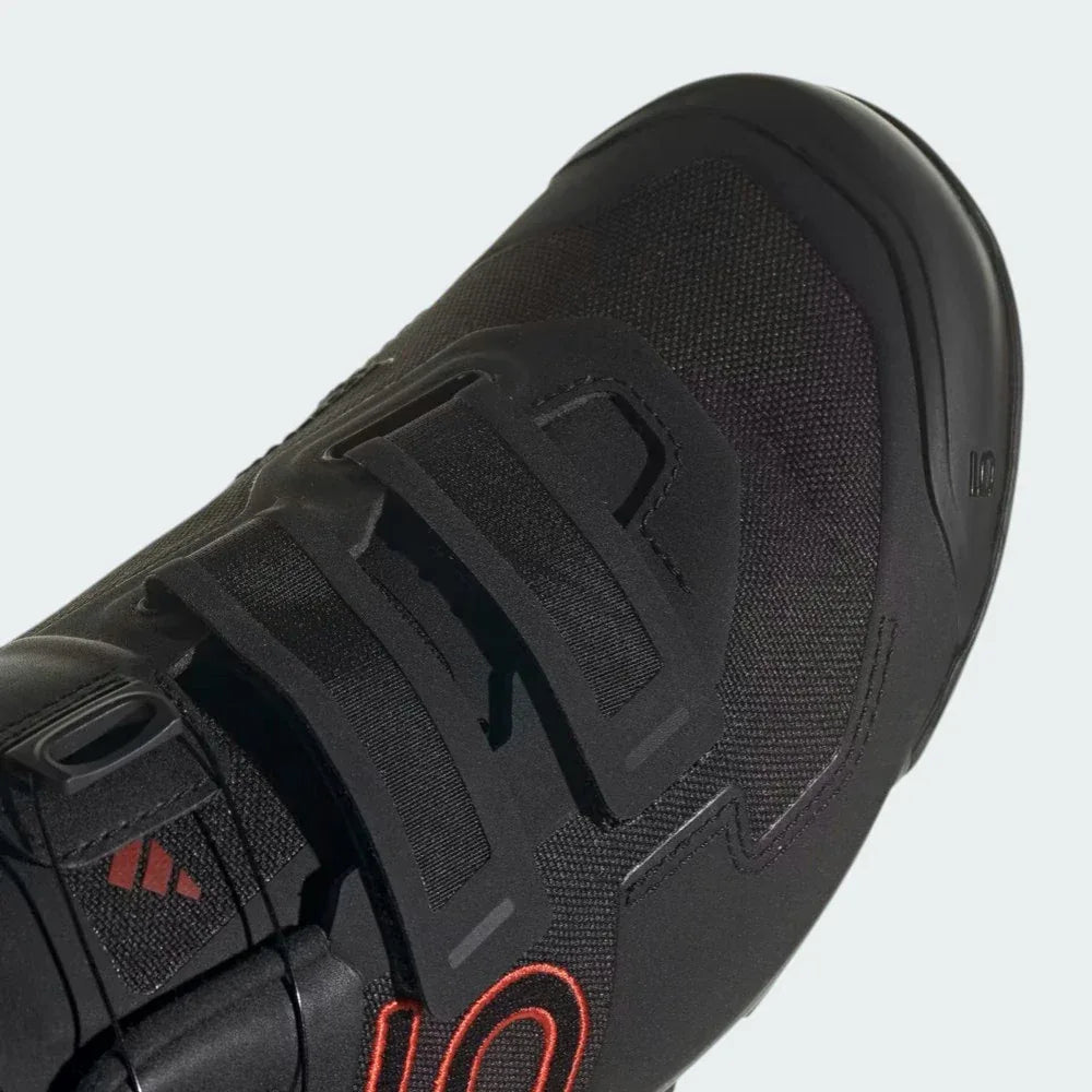 Close-up of the toe box and BOA dial, showcasing the abrasion-resistant materials and the micro-adjustable hardware