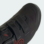 Close-up of the toe box and BOA dial, showcasing the abrasion-resistant materials and the micro-adjustable hardware