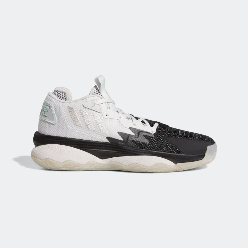 Highlights the high-velocity "Clear Mint" accents and the professional texture of the Dash Grey textile upper. Main image