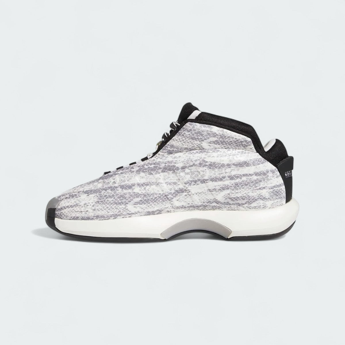 Adidas Crazy 1 Men's "Snake Skin" trainers, inside profile in white and black, highlighting the inner arch support and textured upper.