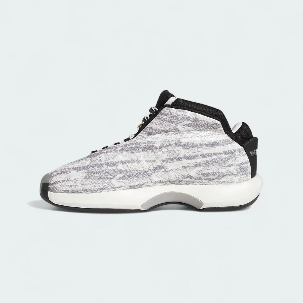 Adidas Crazy 1 Men's "Snake Skin" trainers, inside profile in white and black, highlighting the inner arch support and textured upper.
