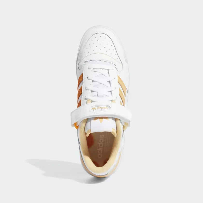 Focuses on the "locked-in" strap closure and the high-quality texture of the leather toe box.