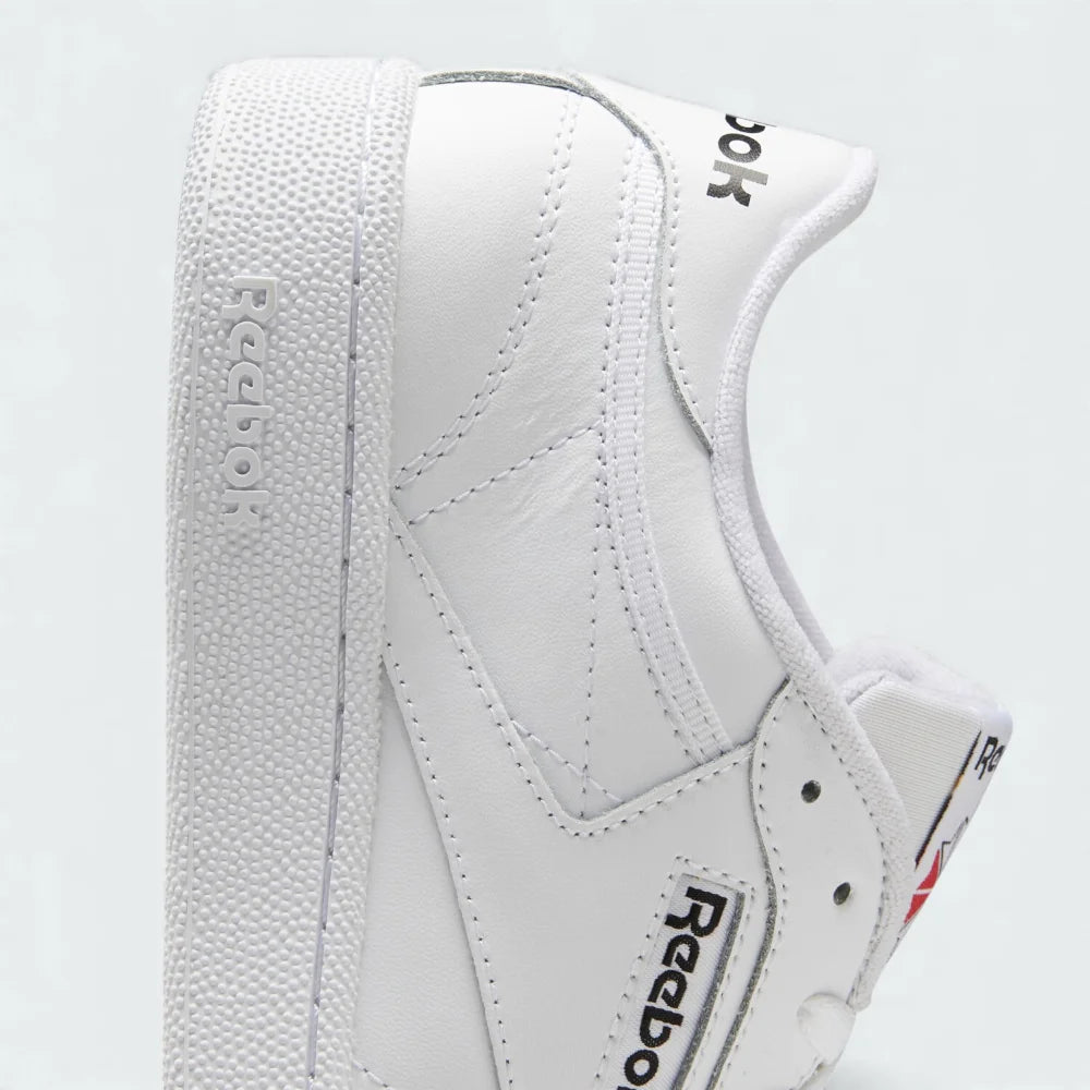 Detail view of the heel and collar of the Reebok Club C 85 trainers, illustrating the cushioning around the ankle opening and the supportive structure of the Cloud White leather.