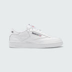 Reebok Classic Club C 85 Unisex trainers in cloud white leather with black accents, side profile showing the iconic low-cut silhouette, cushioned midsole, and Reebok window logo.
