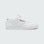 Reebok Classic Club C 85 Unisex trainers in cloud white leather with black accents, side profile showing the iconic low-cut silhouette, cushioned midsole, and Reebok window logo.