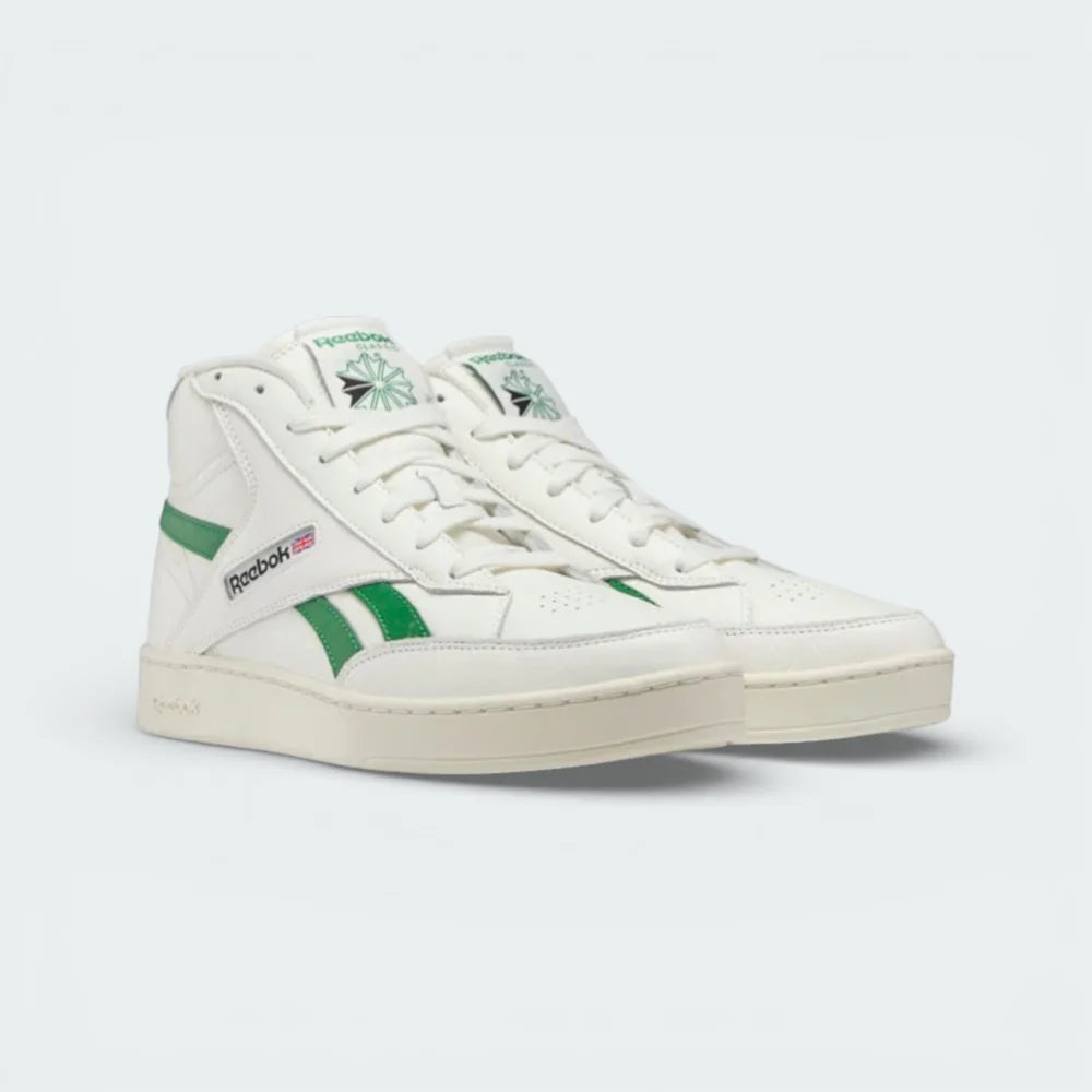 Angled shot of both Reebok Club C Form High trainers side by side, showcasing the premium materials and the vintage 80s court aesthetic.