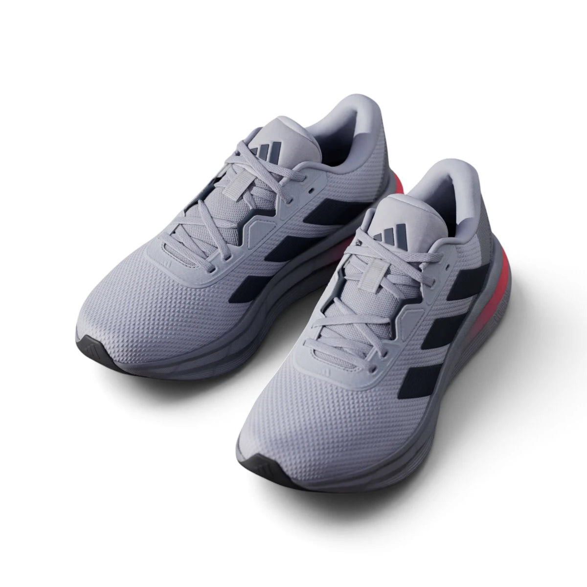 Angled front-three-quarter perspective capturing the reinforced toe box, technical mesh texture, and smooth transition into the cushioned midsole.