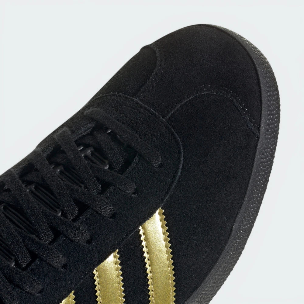 A close-up of the smooth leather grain and the precision stitching on the Core Black toe box.