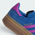 Highlights the "unreal" textured finish of the stacked platform walls and its robust, clean bonding to the upper suede.