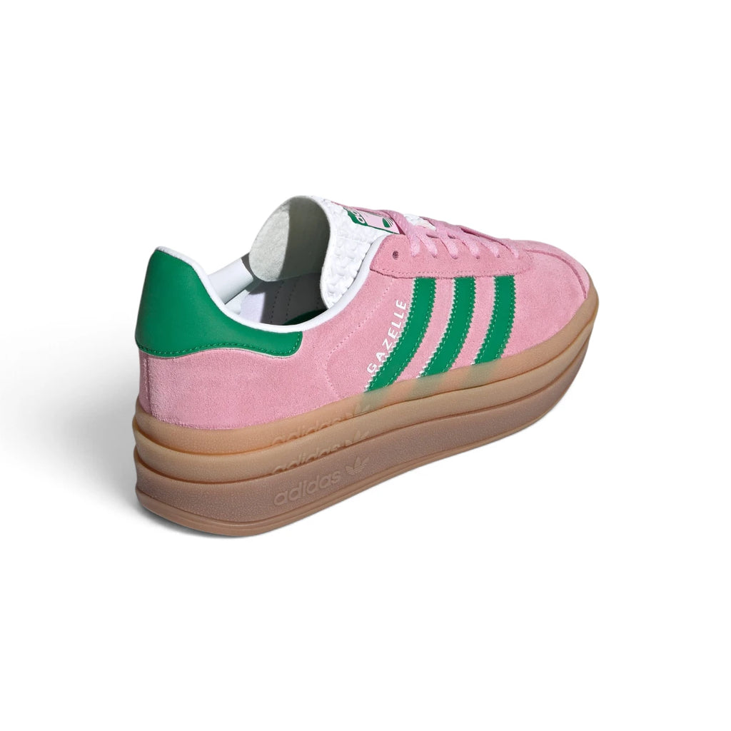 View from Behind Looking at the Rear: Rear-facing perspective focusing onमूल the green leather heel tab, stitched rear collar seams, and the stacked textured sidewalls of the gum platform midsole.   