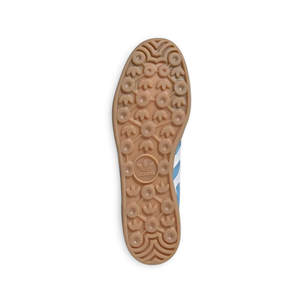 Outsole View: Showing the signature Adidas-patterned traction on the durable, translucent gum rubber sole.