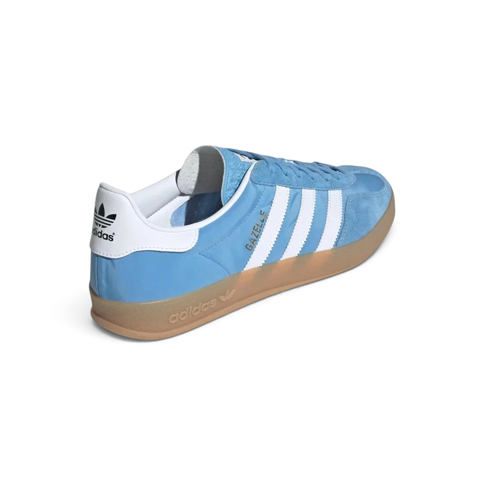 Focusing on the Cloud White heel tab and the unique wrap-around design of the gum sole.