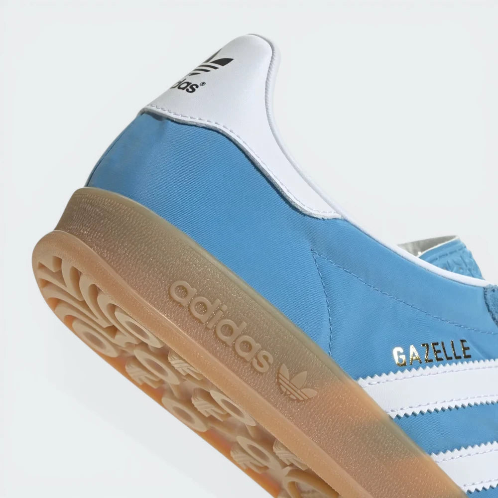 Zoom Looking at the Outsole and Midsole: Highlighting the translucent nature of the gum rubber and the high-quality gold foil detailing.
