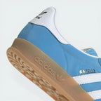 Zoom Looking at the Outsole and Midsole: Highlighting the translucent nature of the gum rubber and the high-quality gold foil detailing.