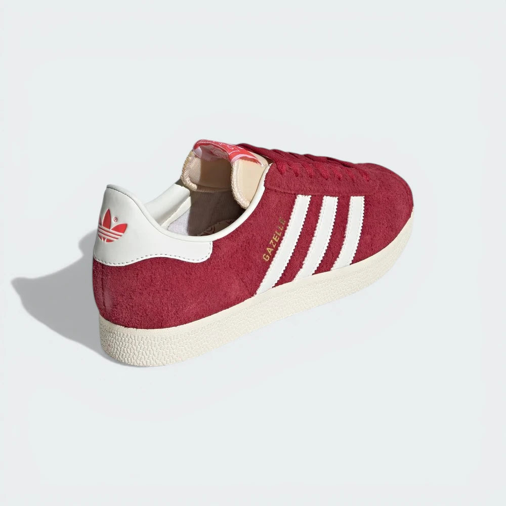 Focusing on the Off White heel tab and the seamless transition into the cream outsole.