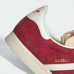 Highlighting the textured nature of the rubber and the quality of the gold foil detailing.