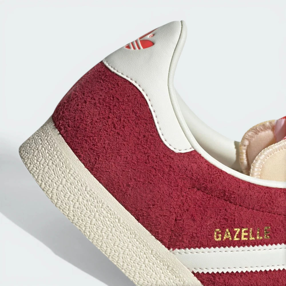 Highlighting the textured nature of the rubber and the quality of the gold foil detailing.