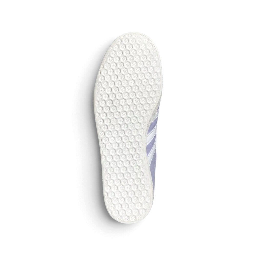 Full-length bottom profile showing the translucent rubber outsole, highlighting the hexagonal multi-directional traction pattern designed for optimal grip on urban surfaces.