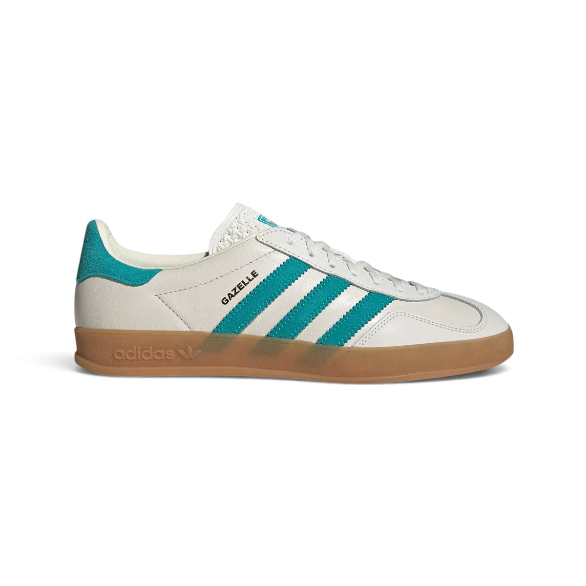 Studio lateral shot of the adidas Gazelle in Chalk White and teal, highlighting the smooth leather upper, vibrant teal serrated three stripes, gold foil GAZELLE lettering, and translucent gum rubber outsole. Main image