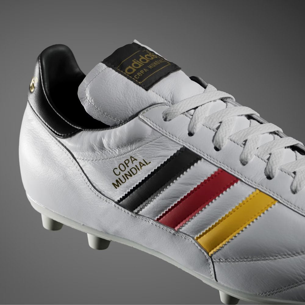 Highlighting the transition between the soft leather upper and the durable, high-traction FG chassis.