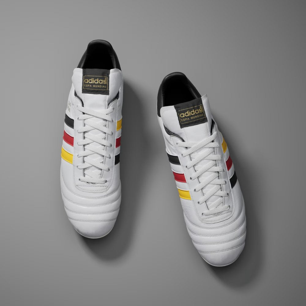 Looking down at the premium leather stitching, the white lacing system, and the classic fold-over tongue.