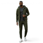Nike NSW Optic Tracksuit in olive green, front view worn by a model showing the full-zip hoodie and matching tapered pants.
