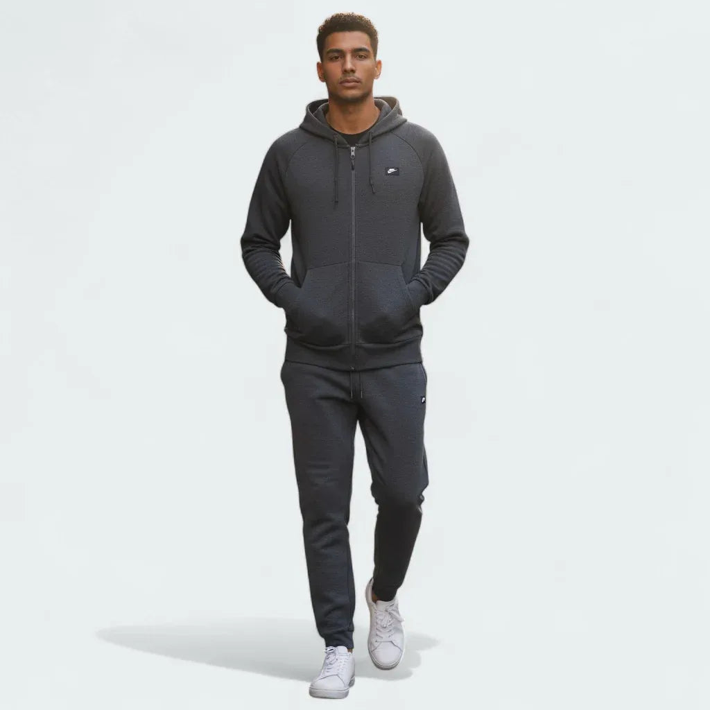 Nike Optic Zip Suit in slate grey, front view worn by a model showing the fit Main image