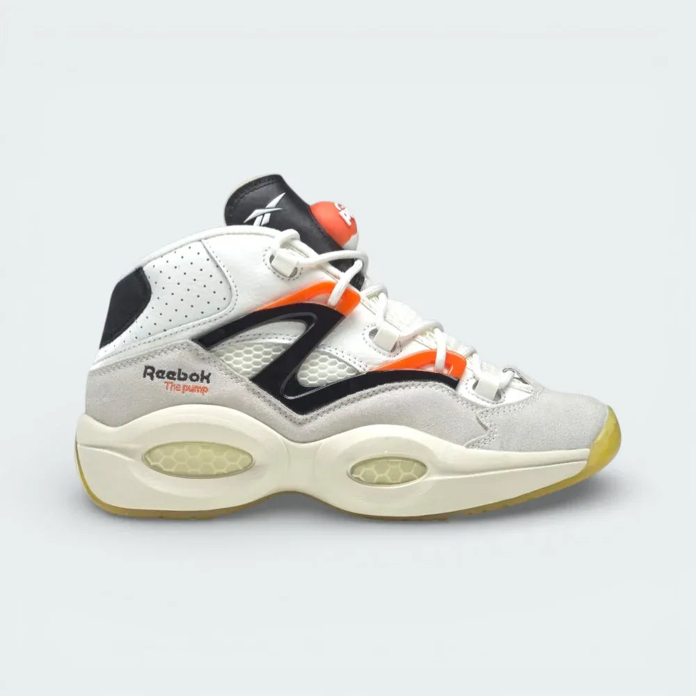 Side profile of the Reebok Question Pump in Chalk, showing the grey suede mudguard, visible Hexalite cushioning, and the classic orange Pump tongue.