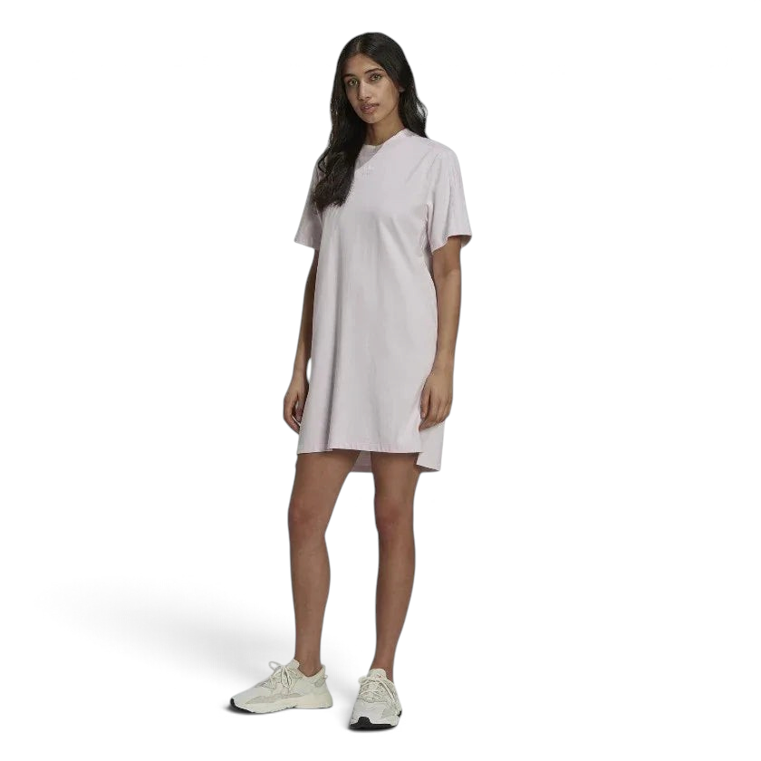 Adidas Tennis Luxe Tee Dress Women's in ambient blush pink, front view on a model, showing its relaxed, oversized fit, ribbed crew neck, and short sleeves. Main image