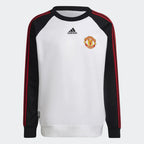 Focuses on the ribbed crewneck and the high-quality piqué texture.