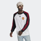 Highlights the trademark loose-fit silhouette and the distinctive Teamgeist curved seam lines.