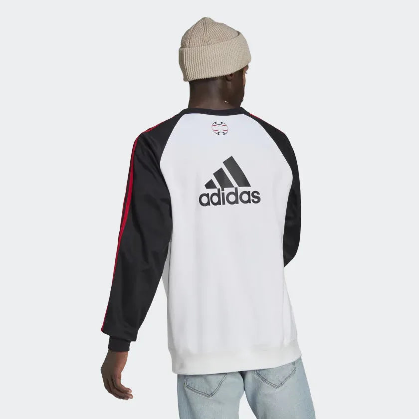 Focusing on the clean back design and the professional finish of the ribbed hem.