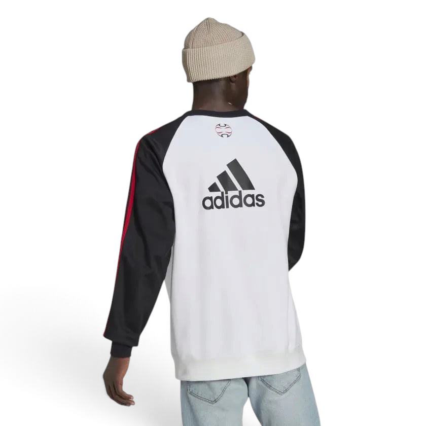 Focusing on the clean back design and the professional finish of the ribbed hem.