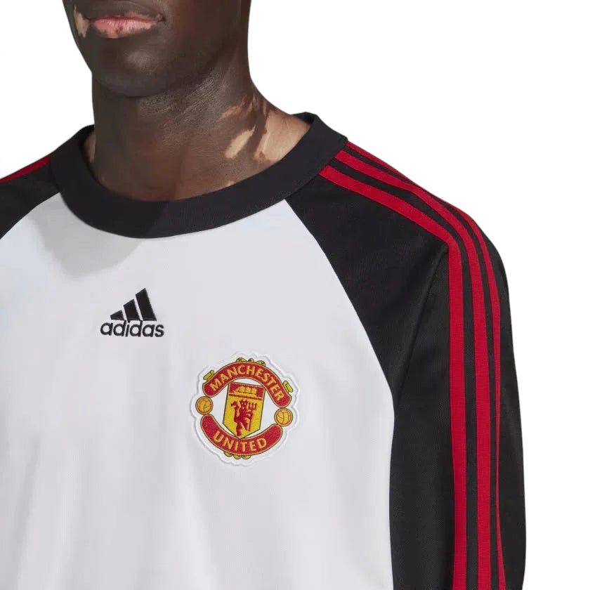 A close-up of the premium embroidered Manchester United badge.
