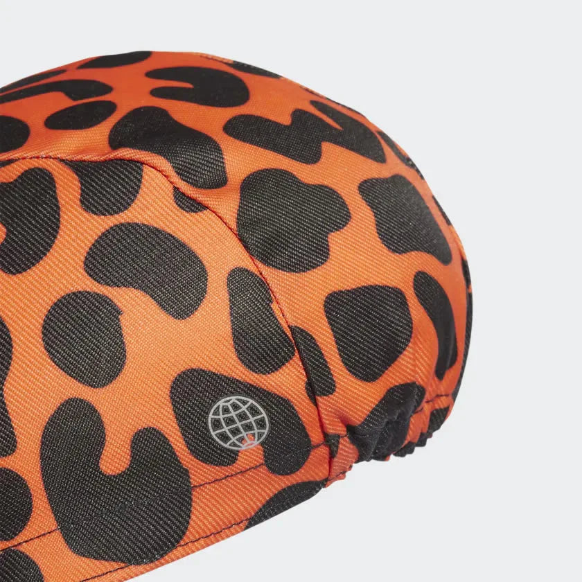 Showcasing the "unreal" lightweight drape and the high-contrast Orange/Black leopard saturation from a 45-degree angle.