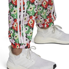 Trade Sports Adidas x Marimekko track pants featuring a vibrant Unikko poppy floral print and white 3-Stripes detail.