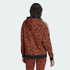 Adidas x Rich Mnisi Hoodie Women's in an orange and black leopard print, back view showcasing the continuation of the all-over graphic.