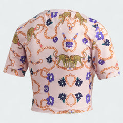 Adidas x Her Studio London Cropped Tee in a multi-color floral print, back view showcasing the continuation of the vibrant all-over graphic.
