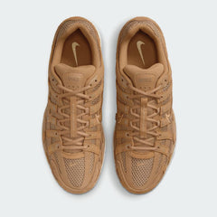 Top-down view of a pair of Nike P-6000 SE men's trainers in flax, highlighting the intricate layered upper and lace-up closure.